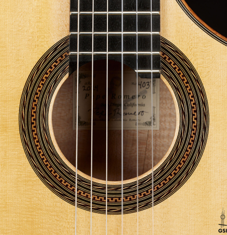 The rosette of a 2024 Pepe Romero "cutaway" classical guitar made of spruce and CSA rosewood