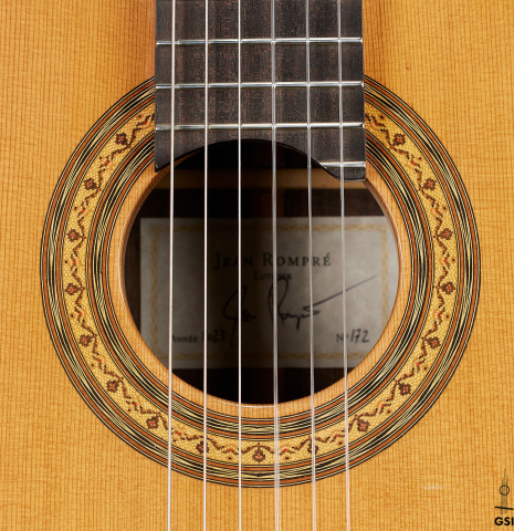 The rosette of a 2023 Jean Rompre classical guitar made of cedar and Indian rosewood