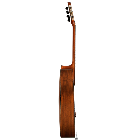 The side of a 2023 Jean Rompre classical guitar made of cedar and Indian rosewood