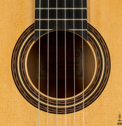 The rosette of a 2006 Pepe Romero classical guitar made of spruce and cypress