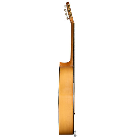 The side of a 2006 Pepe Romero classical guitar made of spruce and cypress