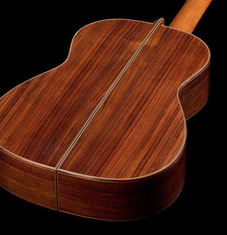 The back and sides of a 2023 Guitarras Romero "Espana" classical guitar made of cedar and Indian rosewood