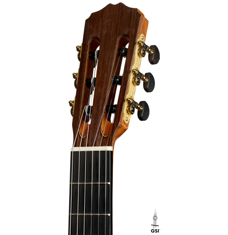The headstock of a 2023 Guitarras Romero "Espana" classical guitar made of cedar and Indian rosewood