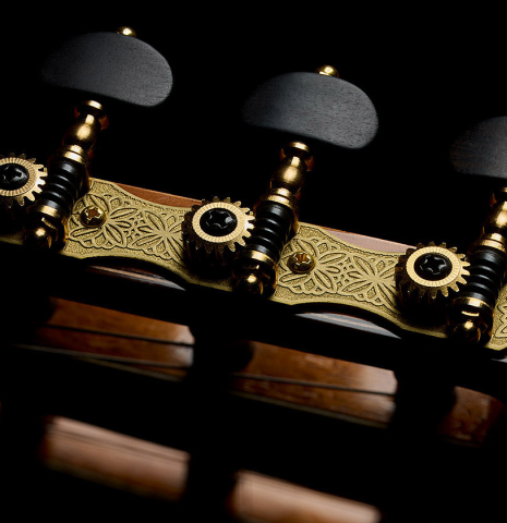 The tuning machines of a 2023 Guitarras Romero "Espana" classical guitar made of cedar and Indian rosewood