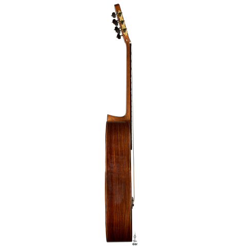 The side of a 2023 Guitarras Romero "Espana" classical guitar made of cedar and Indian rosewood