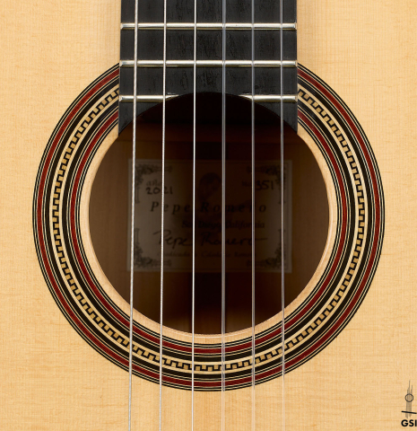 The rosette of a 2021 Pepe Romero "640" classical guitar made of spruce and cypress