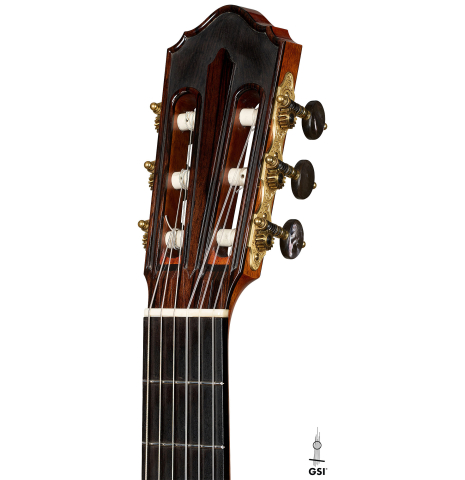 The headstock of a 2018 Jean Rompre classical guitar made of spruce and Makassar ebony