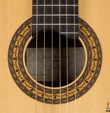 The rosette of a 2018 Jean Rompre classical guitar made of spruce and Makassar ebony