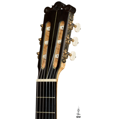 The headstock of a 1999 Ignacio Rozas classical guitar made of spruce and maple