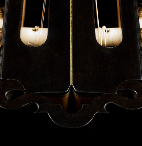 The "torreador cap" headstock and tuning machines of a 1999 Ignacio Rozas classical guitar made of spruce and maple