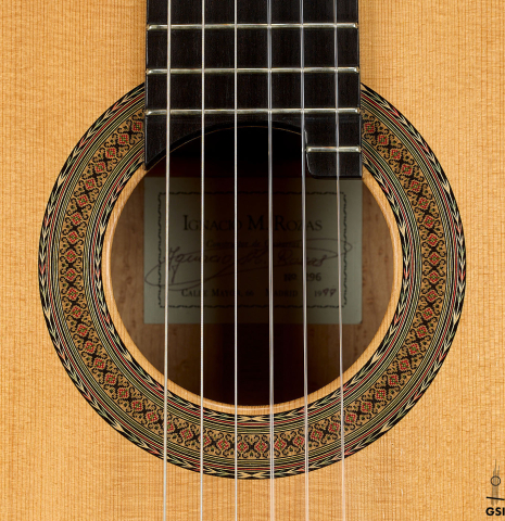 The rosette of a 1999 Ignacio Rozas classical guitar made of spruce and maple