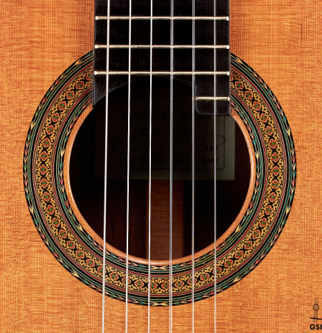 The rosette of a 2001 Ignacio Rozas classical guitar made of cedar and CSA rosewood