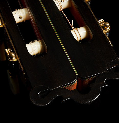 The headstock and tuning machines of a 2008 Ignacio Rozas "640" classical guitar made of cedar and CSA rosewood