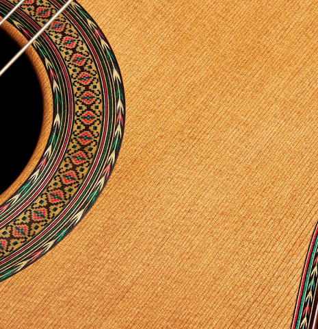 The soundboard and rosette detail of a 2008 Ignacio Rozas "640" classical guitar made of cedar and CSA rosewood