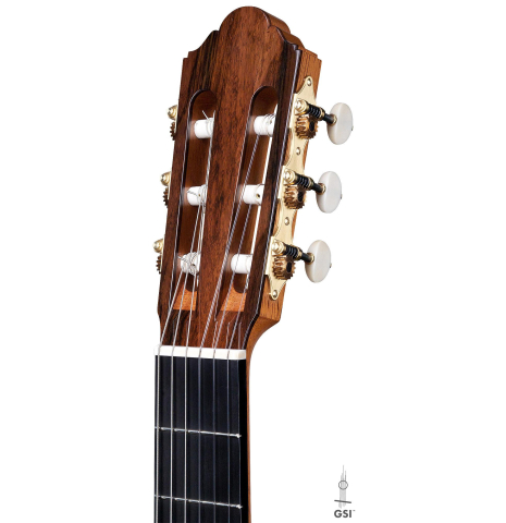 The headstock and tuners of a 2017 Jochen Rothel classical guitar made with cedar and satinwood