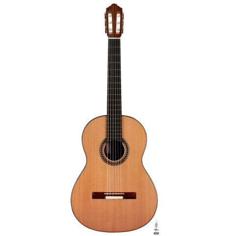 The front of a 2023 Jochen Rothel classical guitar made with cedar top and African rosewood back and sides on a white background