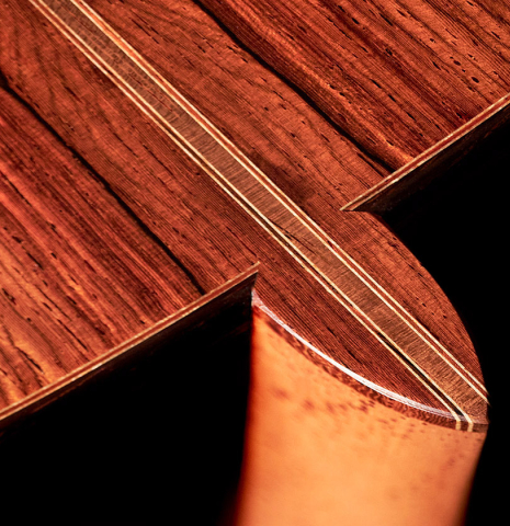 The back and heel of a 2023 Jochen Rothel classical guitar made with cedar top and African rosewood back and sides