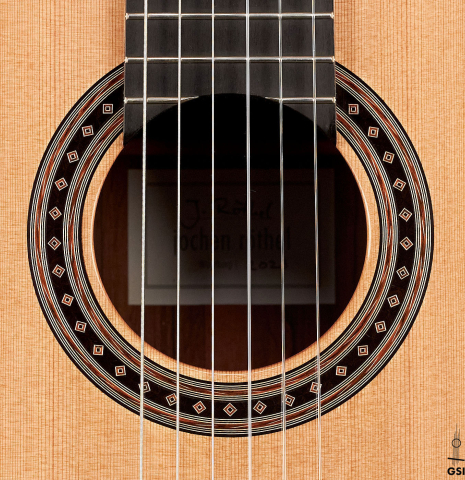 The rosette of a 2023 Jochen Rothel classical guitar made with cedar top and African rosewood back and sides