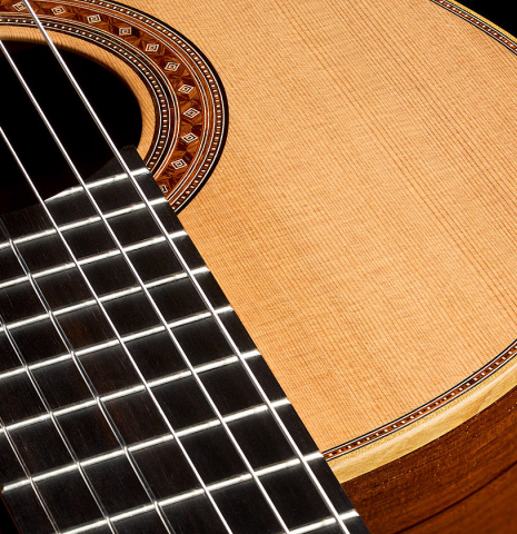 The soundboard as viewed from the fingerboard of a 2026 Jochen Röthel classical guitar made of cedar and African rosewood