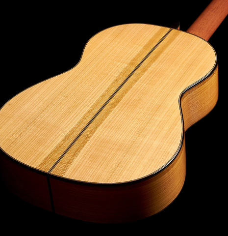 The back of a 2022 Jochen Rothel classical guitar made with spruce top and cherry back and sides