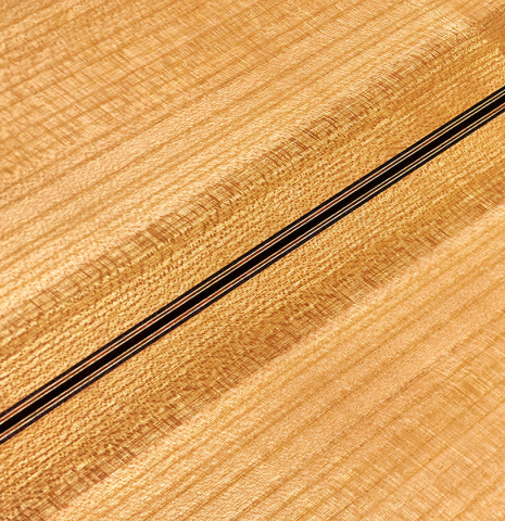 Cherry back of a 2022 Jochen Rothel classical guitar made with spruce top