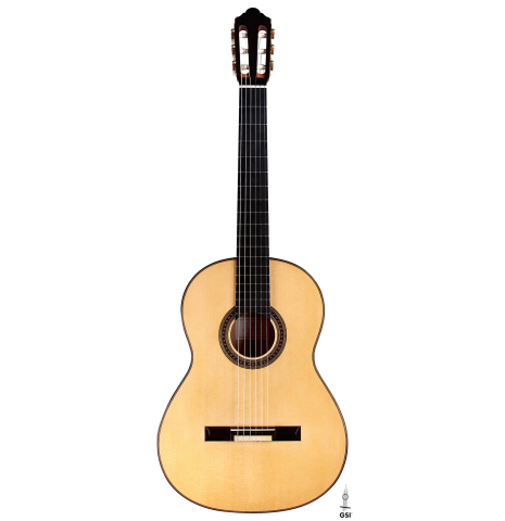 The front of a 2022 Jochen Rothel classical guitar made with spruce top and cherry back and sides