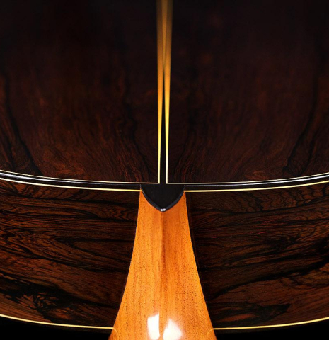 The neck joint, heel, back and sides of a 2017 David Rouse classical guitar made of cedar and CSA rosewood