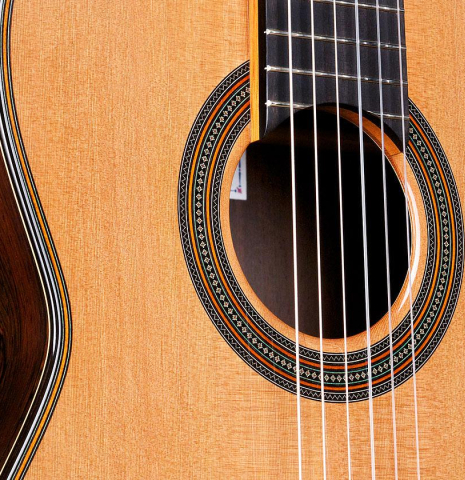 The soundboard of a 2017 David Rouse classical guitar made of cedar and CSA rosewood