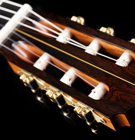 The headstock and Scheller tuning machines of a 2017 David Rouse classical guitar made of cedar and CSA rosewood