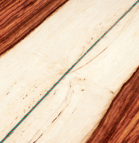 The back of a 2023 German Vazquez Rubio &quot;Classic Estudio&quot; classical guitar made of cedar and palo escrito