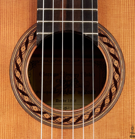 The rosette of a 2023 German Vazquez Rubio &quot;Classic Estudio&quot; classical guitar made of cedar and palo escrito