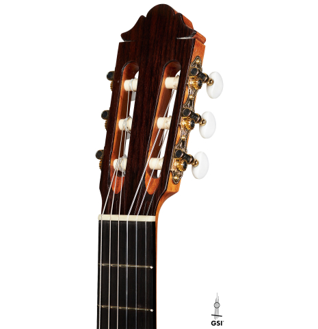 The headstock of a 2024 German Vazquez Rubio "Classic Estudio" classical guitar made of cedar and palo escrito