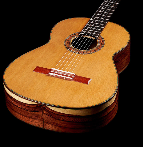 The soundboard of a 2024 German Vazquez Rubio "Classic Estudio" classical guitar made of cedar and palo escrito