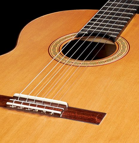 The soundboard of a 2024 German Vazquez Rubio "Classic Estudio" classical guitar made of cedar and palo escrito