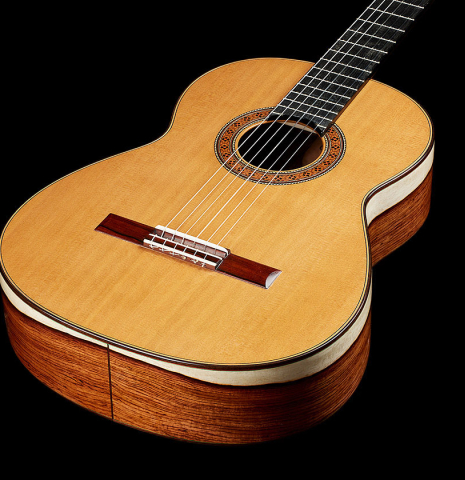 The soundboard of a 2025 German Vazquez Rubio "Classic Estudio" classical guitar made of cedar and palo escrito