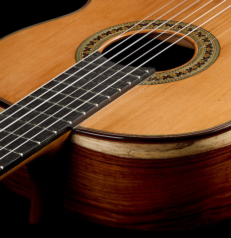 The fingerboard, neck, sides and top of a 2025 German Vazquez Rubio "Classic Estudio" classical guitar made of cedar and palo escrito
