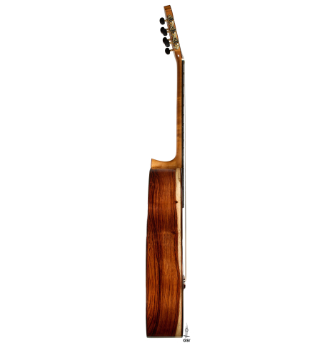 The side of a 2025 German Vazquez Rubio "Classic Estudio" classical guitar made of cedar and palo escrito