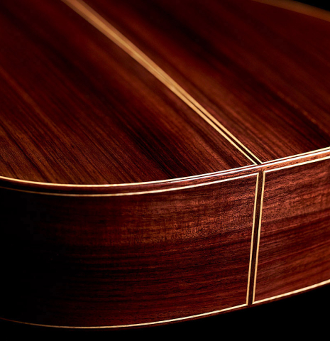 The back and sides of a 2022 German Vazquez Rubio &quot;Solista&quot; classical guitar made with cedar and Indian rosewood
