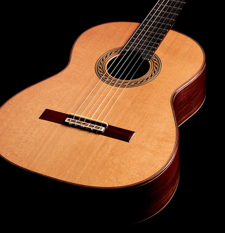 The front of a 2022 German Vazquez Rubio &quot;Solista&quot; classical guitar made with cedar and Indian rosewood