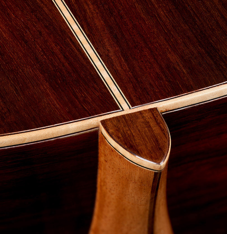 The heel, back binding and purfling of a 2026 German Vazquez Rubio "Solista" classical guitar made of cedar and Indian rosewood