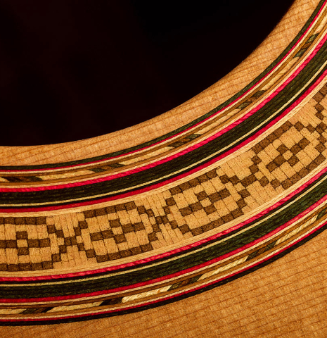 Detailed close-up of the rosette of a 2026 German Vazquez Rubio "Solista" classical guitar made of cedar and Indian rosewood
