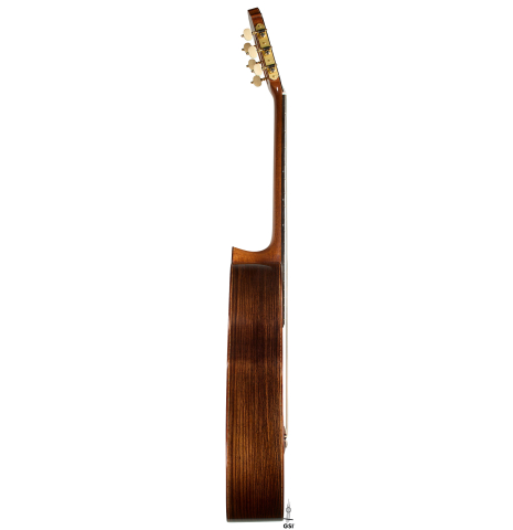 The side of a 2026 German Vazquez Rubio "Solista" classical guitar made of cedar and Indian rosewood