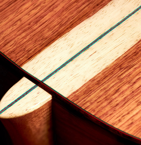 The back and heel of a 2022 German Vazquez Rubio "Classic Estudio" classical guitar made of spruce and Palo Escrito.