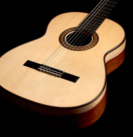 The front of a 2022 German Vazquez Rubio &quot;Classic Estudio&quot; classical guitar made of spruce and Palo Escrito.