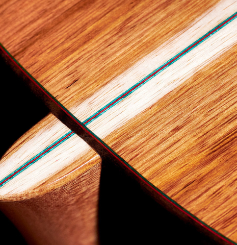 The back and heel of a 2022 German Vazquez Rubio "Classic Estudio" classical guitar made of spruce and Palo Escrito.