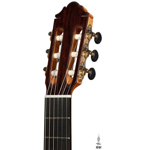 The headstock of a 2025 German Vazquez Rubio "Classic Estudio" classical guitar made of spruce and Palo Escrito.