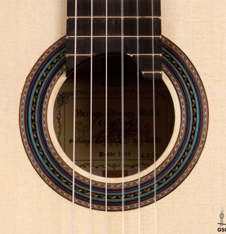 The rosette of a 2021 German Vazquez Rubio "Concert 635" classical guitar made with spruce and maple