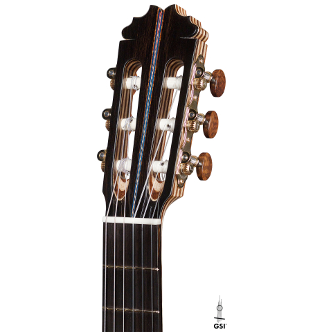 The headstock of a 2021 German Vazquez Rubio &quot;Concert 635&quot; classical guitar made with spruce and maple