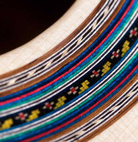 The rosette of a 2021 German Vazquez Rubio "Concert 635" classical guitar made with spruce and maple