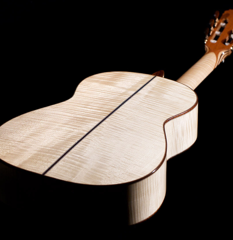 The back of a 2021 German Vazquez Rubio &quot;Concert 635&quot; classical guitar made with spruce and maple